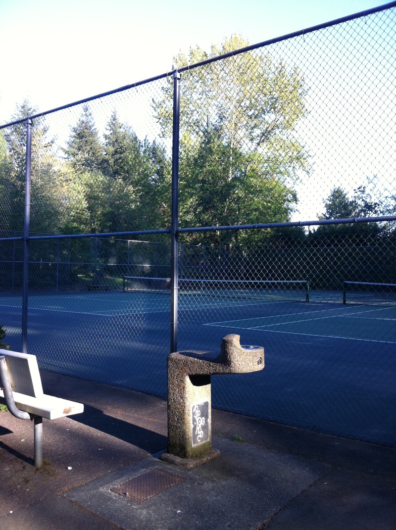 Hillaire Park tennis courts water fountain